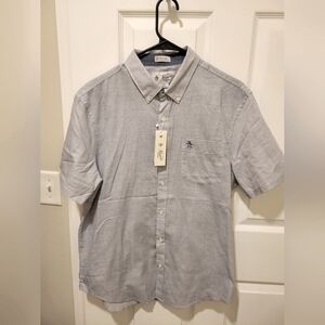 Original Penguin brand short sleeve button down shirt. Men's size large